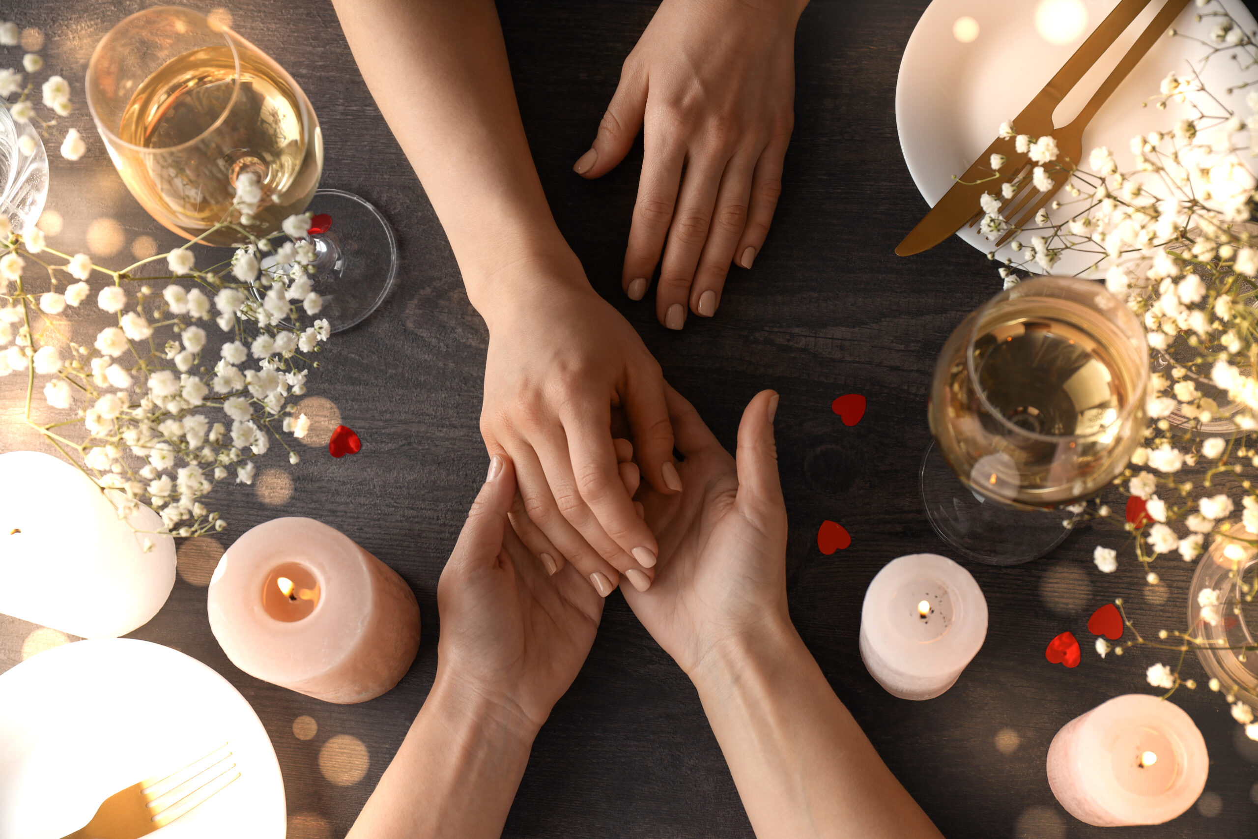 Happy Valentine day dinner on dark wooden background, top view